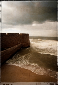 The storm eases against the walls of Akko