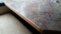 Details -- New custom oak/laminate table with beveled edge.